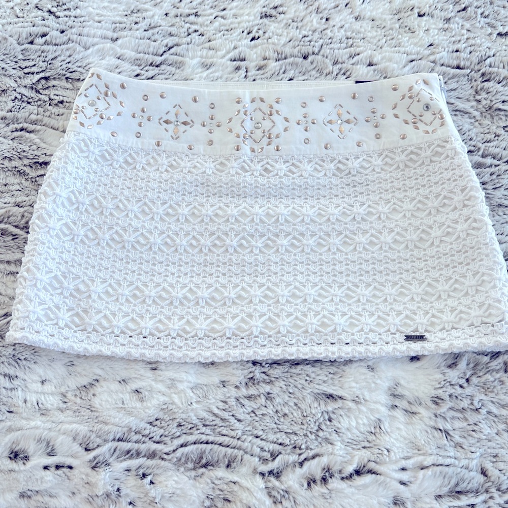 White Ultra mini skirt with crochet, gold , rhinestones and sequins. New !